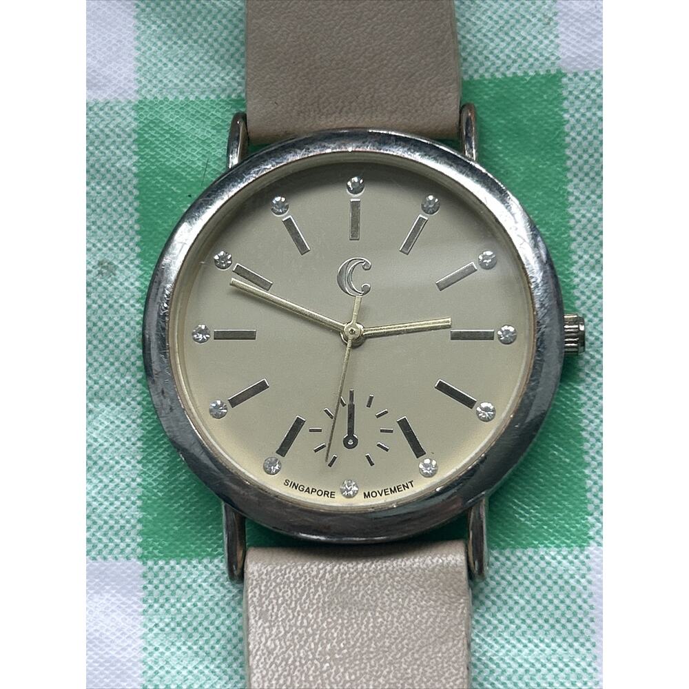 Charming Charlie Beige Silver Tone Women’s Quartz Watch